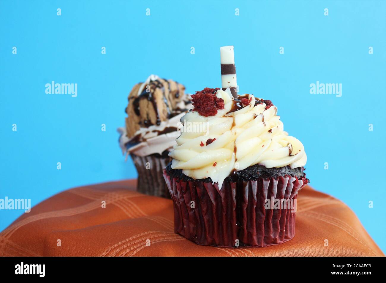 A red velvet cupcake with cream cheese frosting Stock Photo