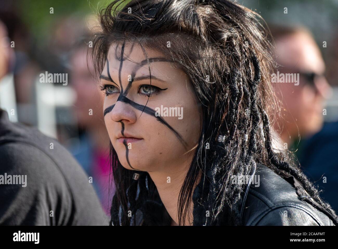 Young goth woman with a face painting Stock Photo