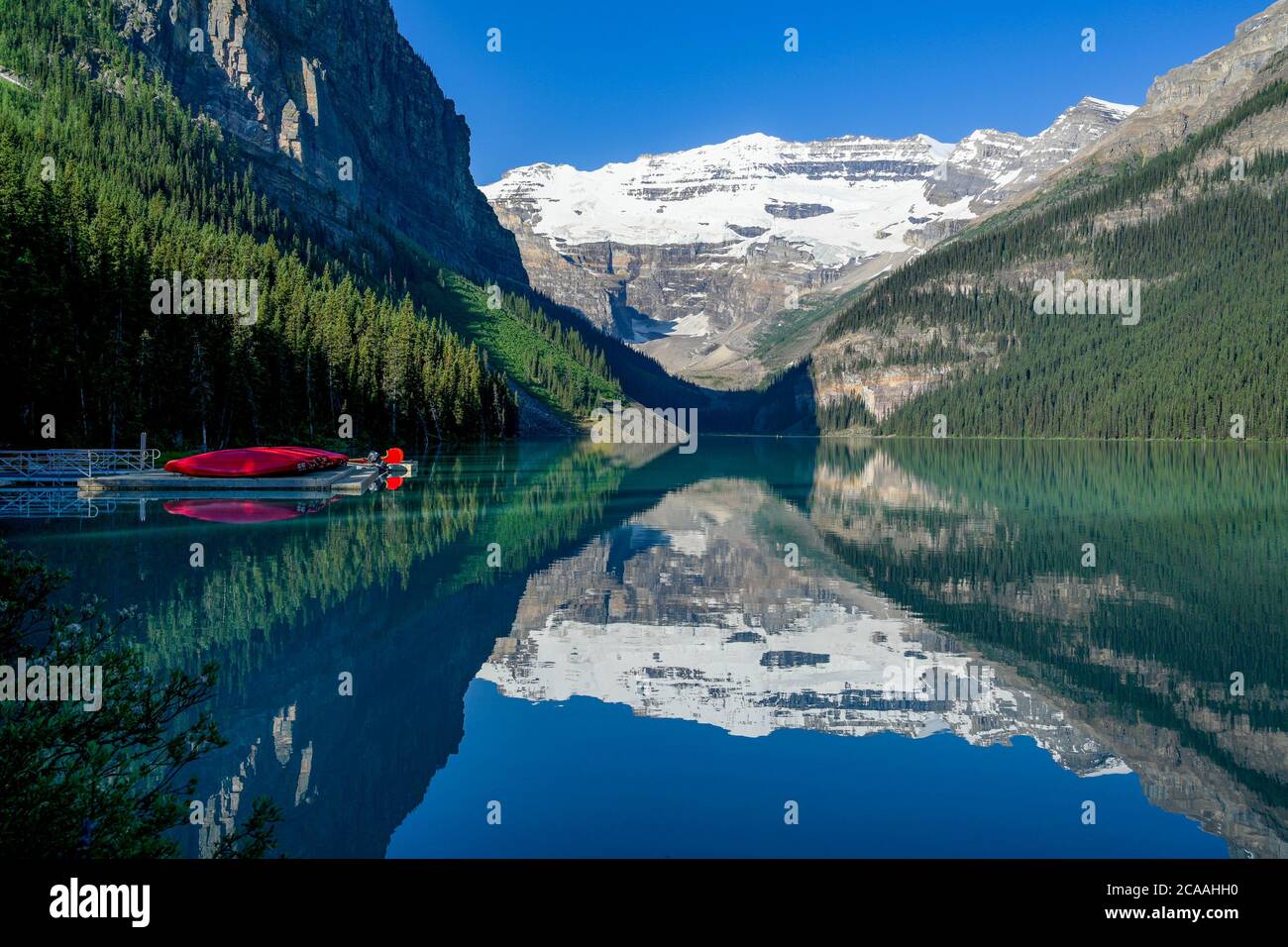 Banff Dock Red canoes on dock, Lake Louise, Banff National Park, Alberta Stock ...