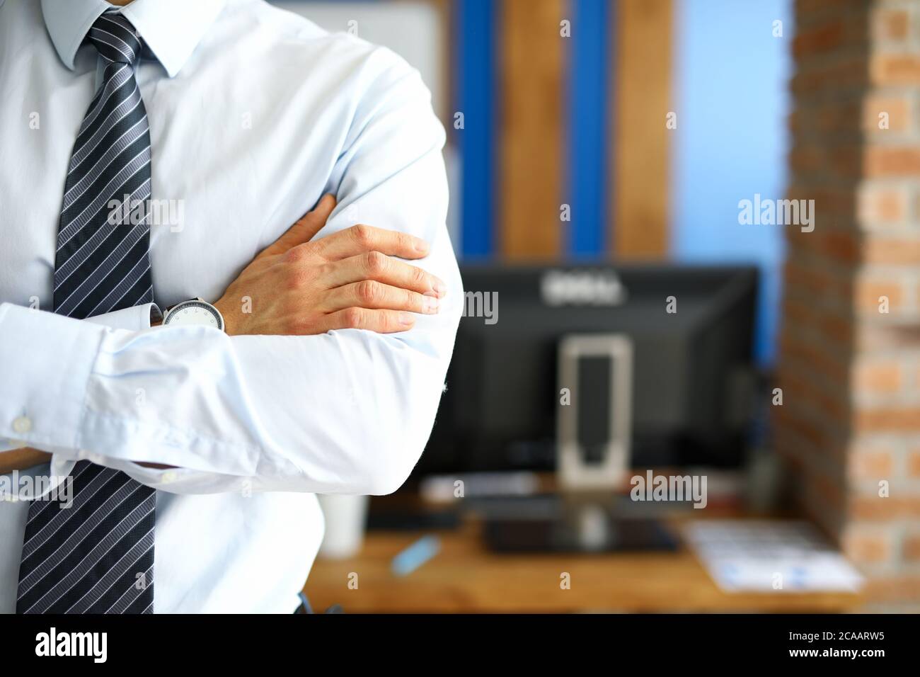 Well dressed adult posing indoors Stock Photo