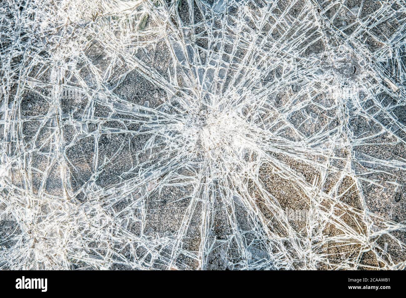cracks on glass texture broken glass transparent Stock Photo