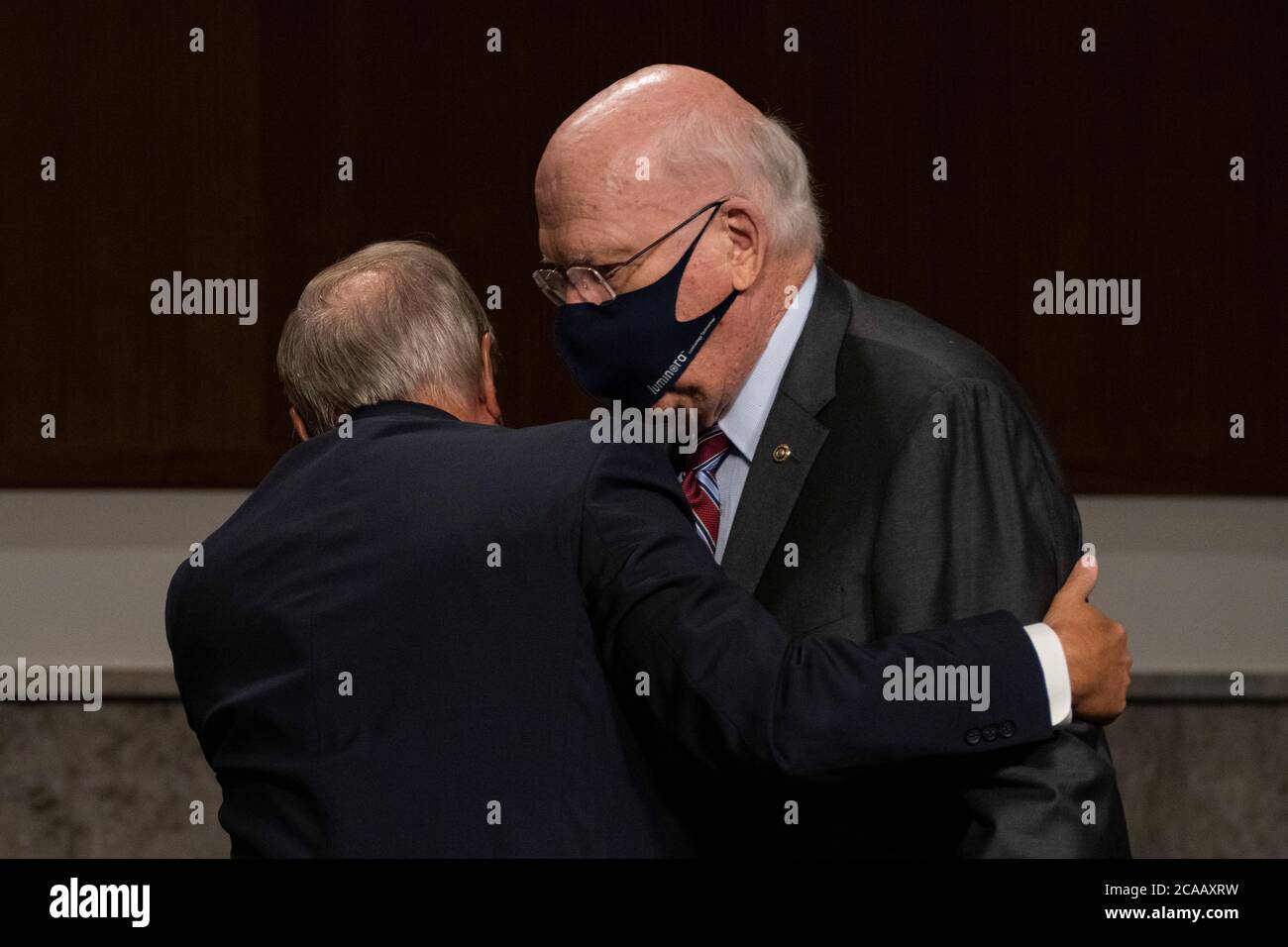 United States Senator Lindsey Graham (Republican of South Carolina), Chairman, US Senate Judiciary Committee, left, embraces US Senator Patrick Leahy (Democrat of Vermont), during a US Senate Judiciary Committee oversight hearing on Capitol Hill in Washington, Wednesday, Aug. 5, 2020, to examine the Crossfire Hurricane investigation. Credit: Carolyn Kaster/Pool via CNP /MediaPunch Stock Photo