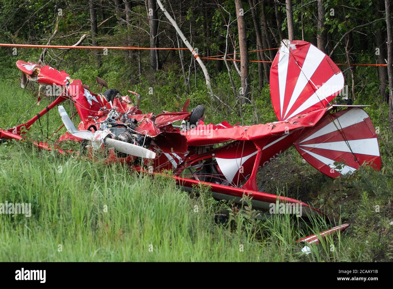 Light plane crash near highway. Stock Photo