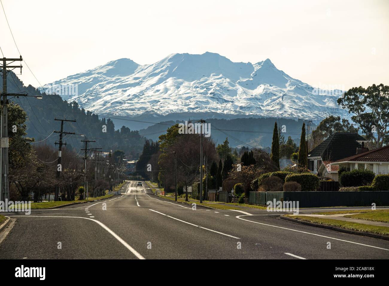 Empty street in Ohakune, New Zealand in winter, with Mt Ruapehu and the Turoa ski field in the background. Stock Photo