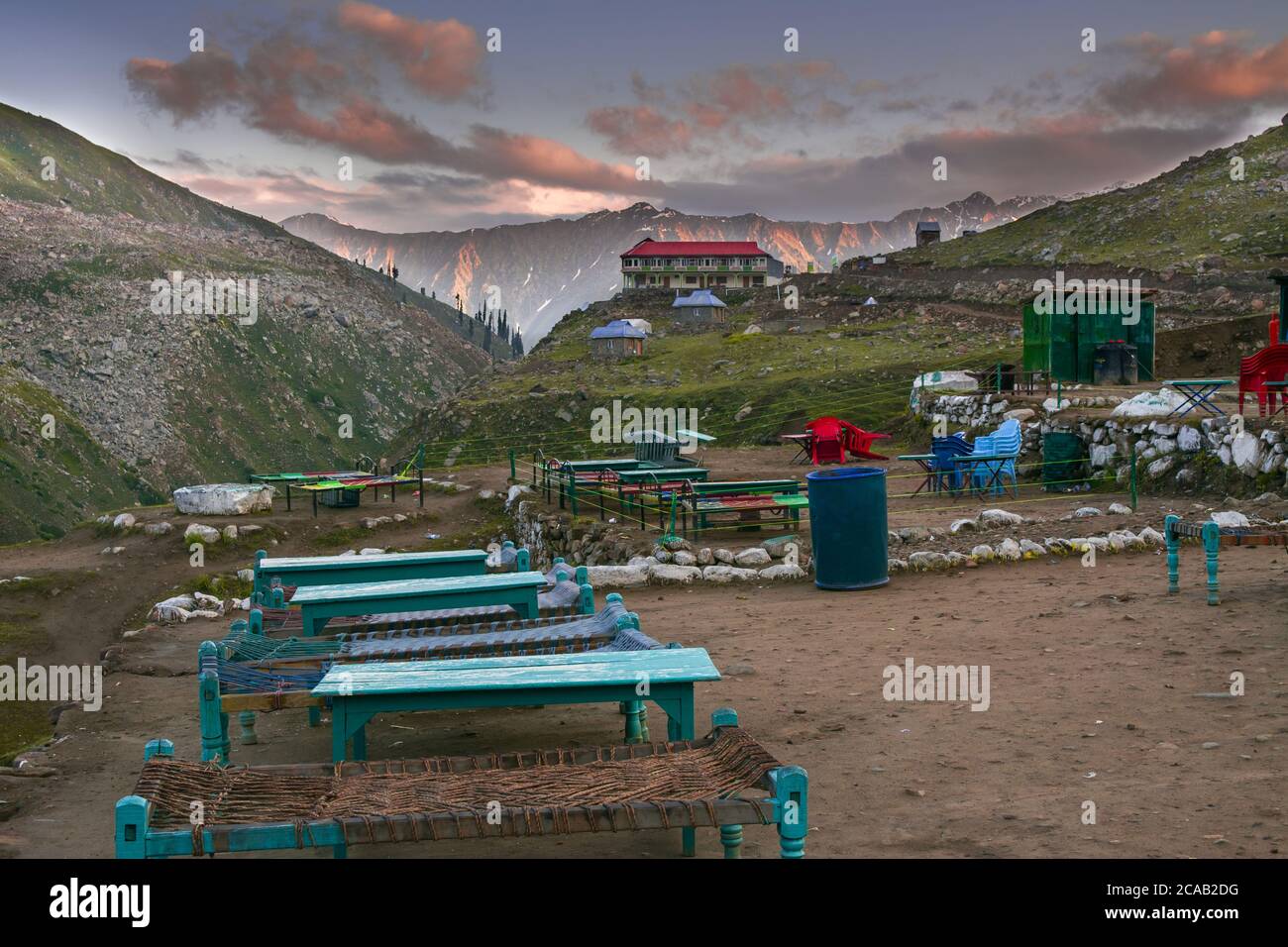 Closeup shot of tourists sitting area behind Naran kaghan saif ul malook lake in Pakistan Stock Photo