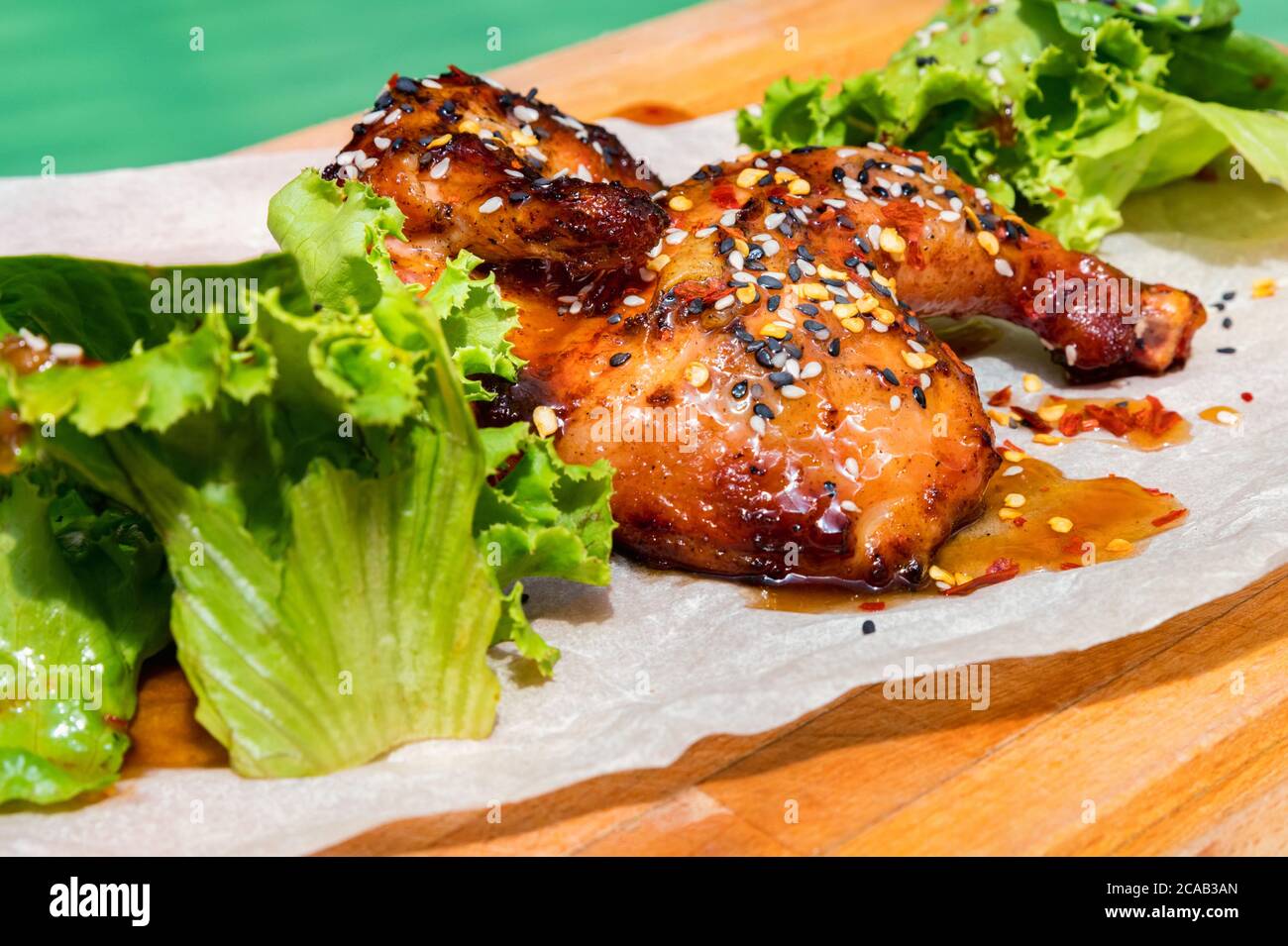 Juicy BBQ chicken leg quarters Food to go Stock Photo Alamy