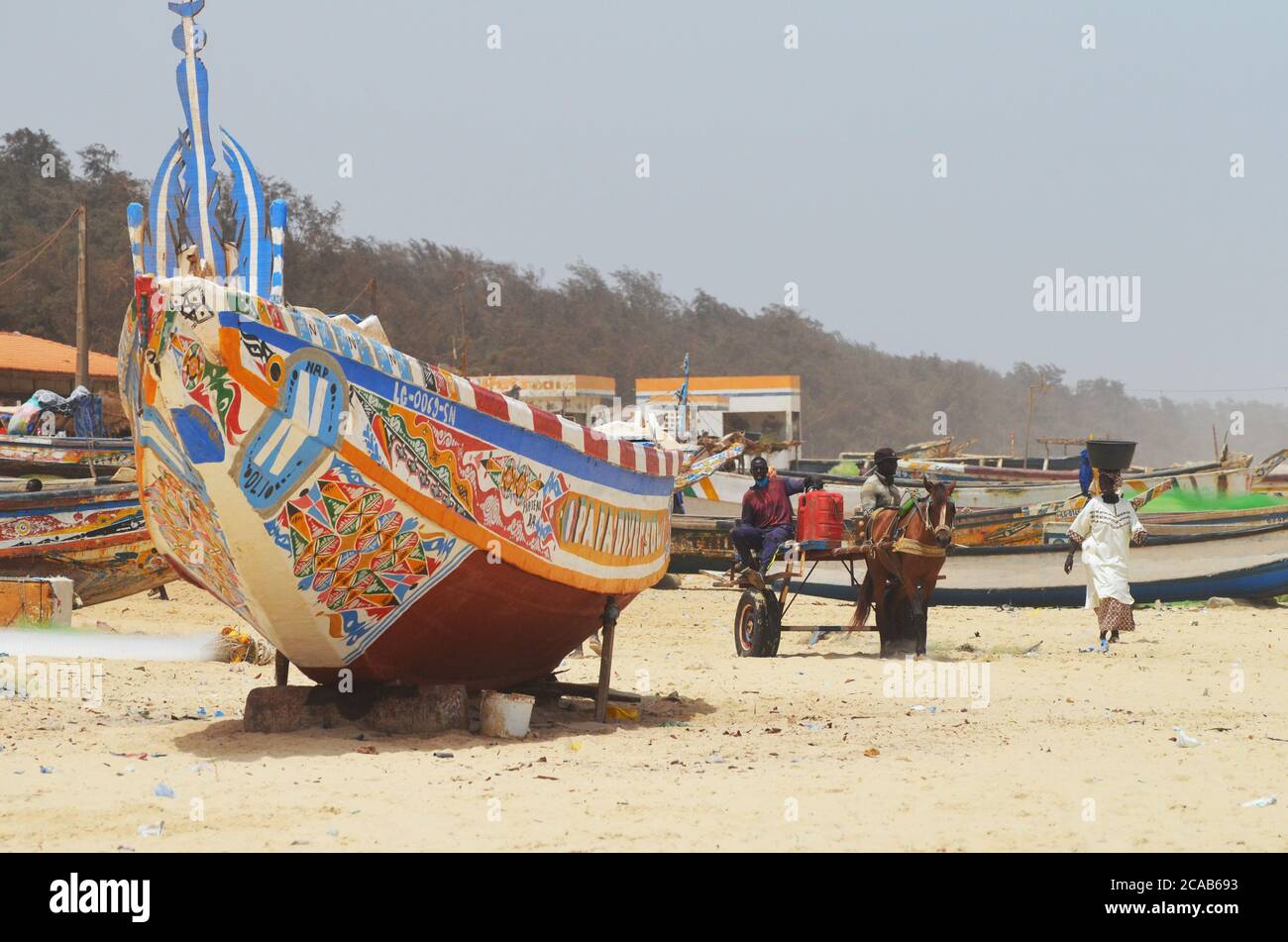 Artisanal fishing boats (pirogues) in the coast of Lompoul, Senegal Stock Photo