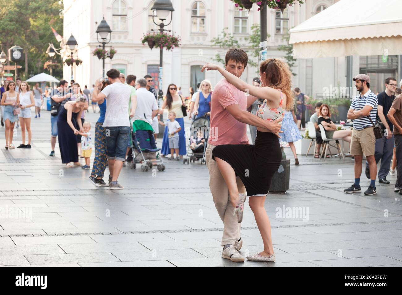 BELGRADE, SERBIA - SEPTEMBER 2, 2018: Couple, a man and a woman, dancing tango as a demo in the city center of Belgrade, on the main pedestrain street Stock Photo