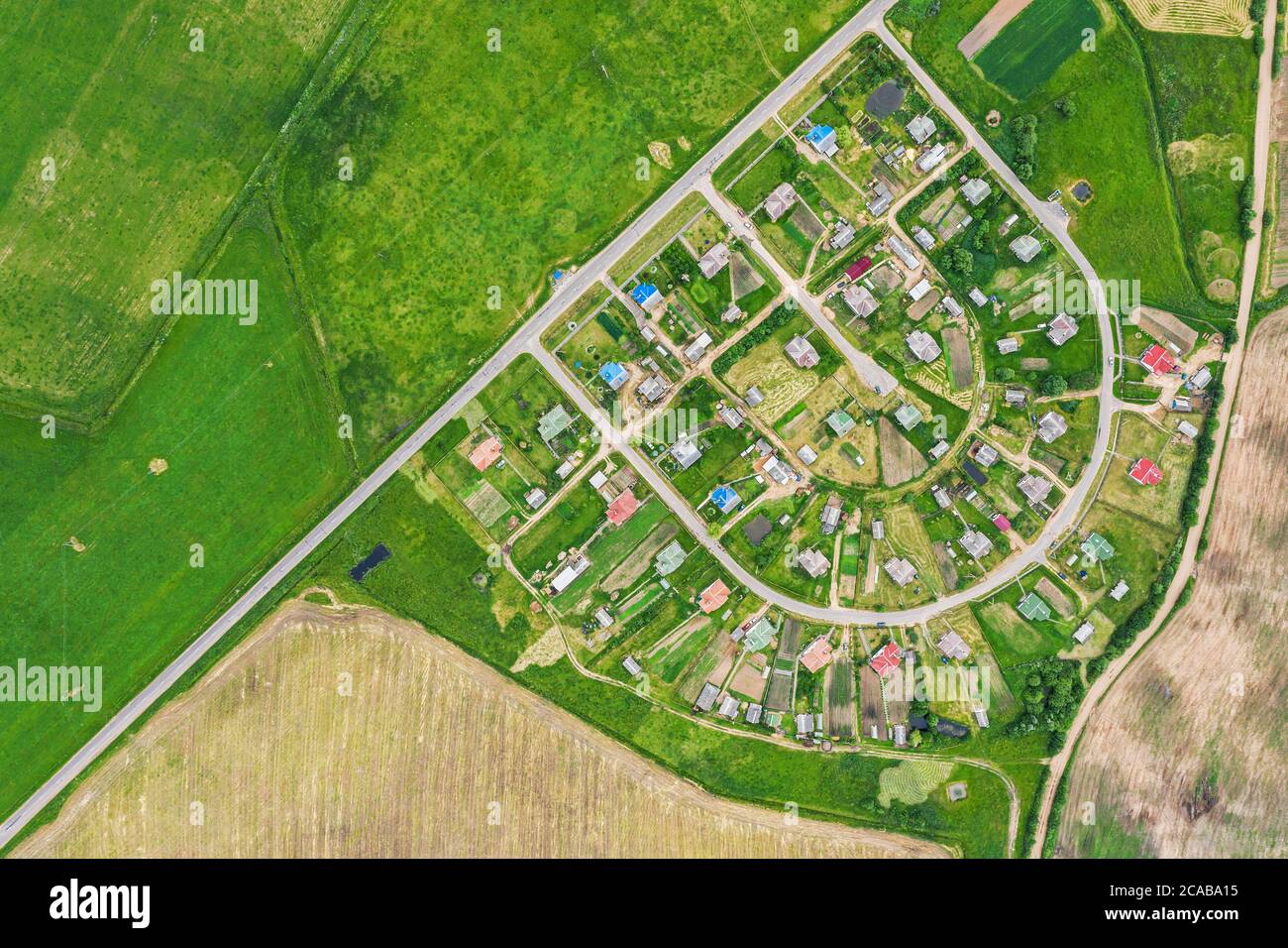 planned residential community in countryside. rural summer landscape, aerial top view Stock Photo