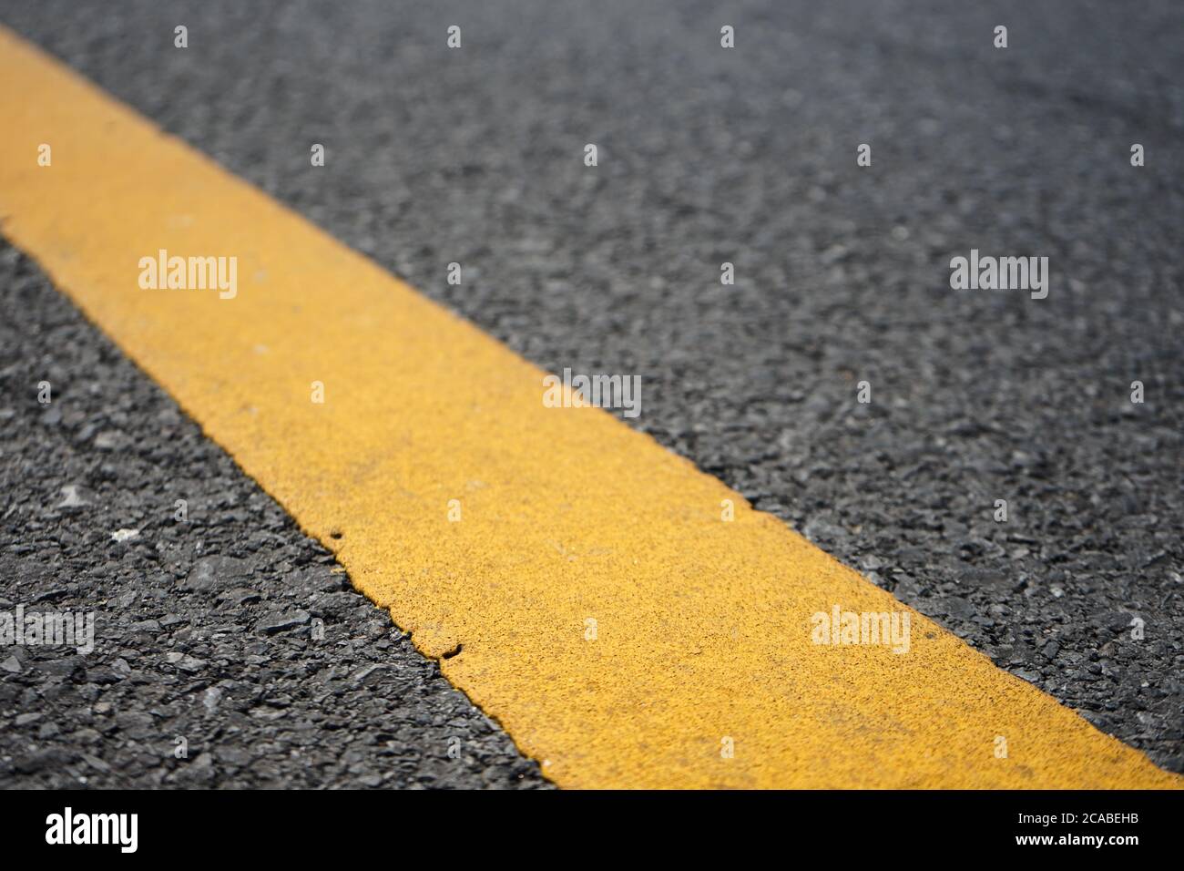 Road traffic paint on the asphalt surface And to ensure safety Stock