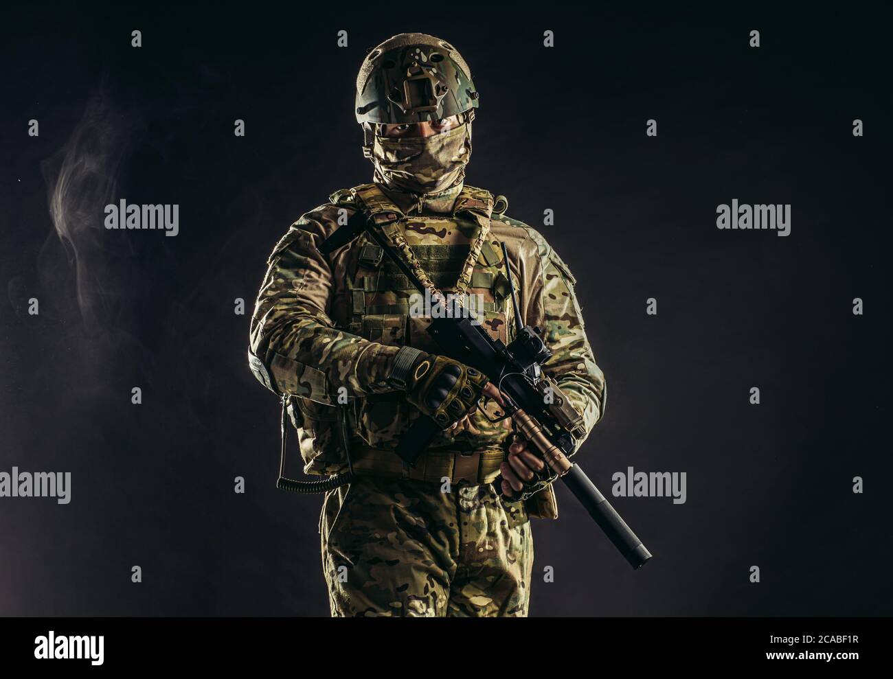 brave strong and confident man soldier wearing army clothes, green