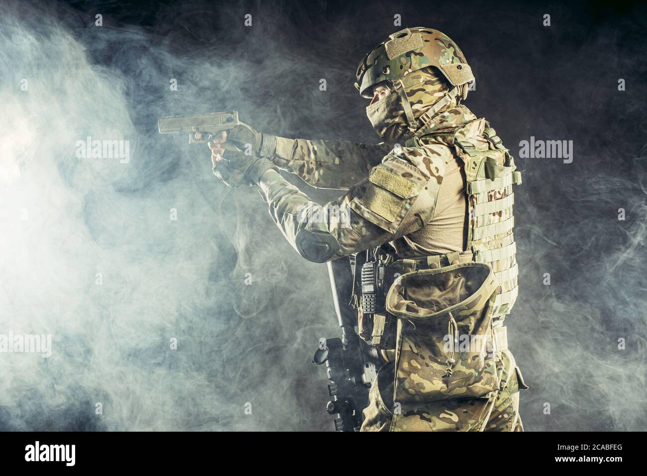 brave strong and confident man soldier wearing army clothes, green