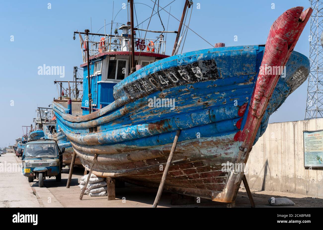 Fishing boats rest in the harbor.  Tianjin is one of major fishing ports along Bohai sea in northern China. Stock Photo