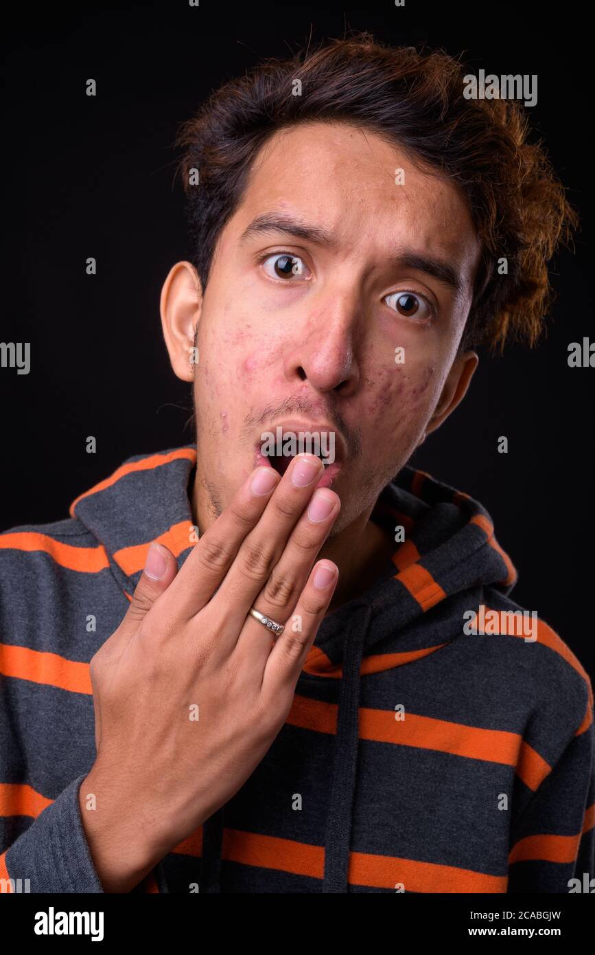 Portrait Of Young Asian Man With Curly Hair Stock Photo Alamy