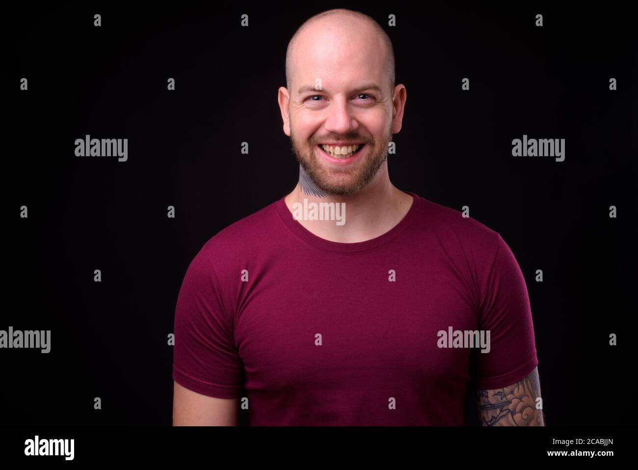 Portrait of happy handsome bald bearded man Stock Photo