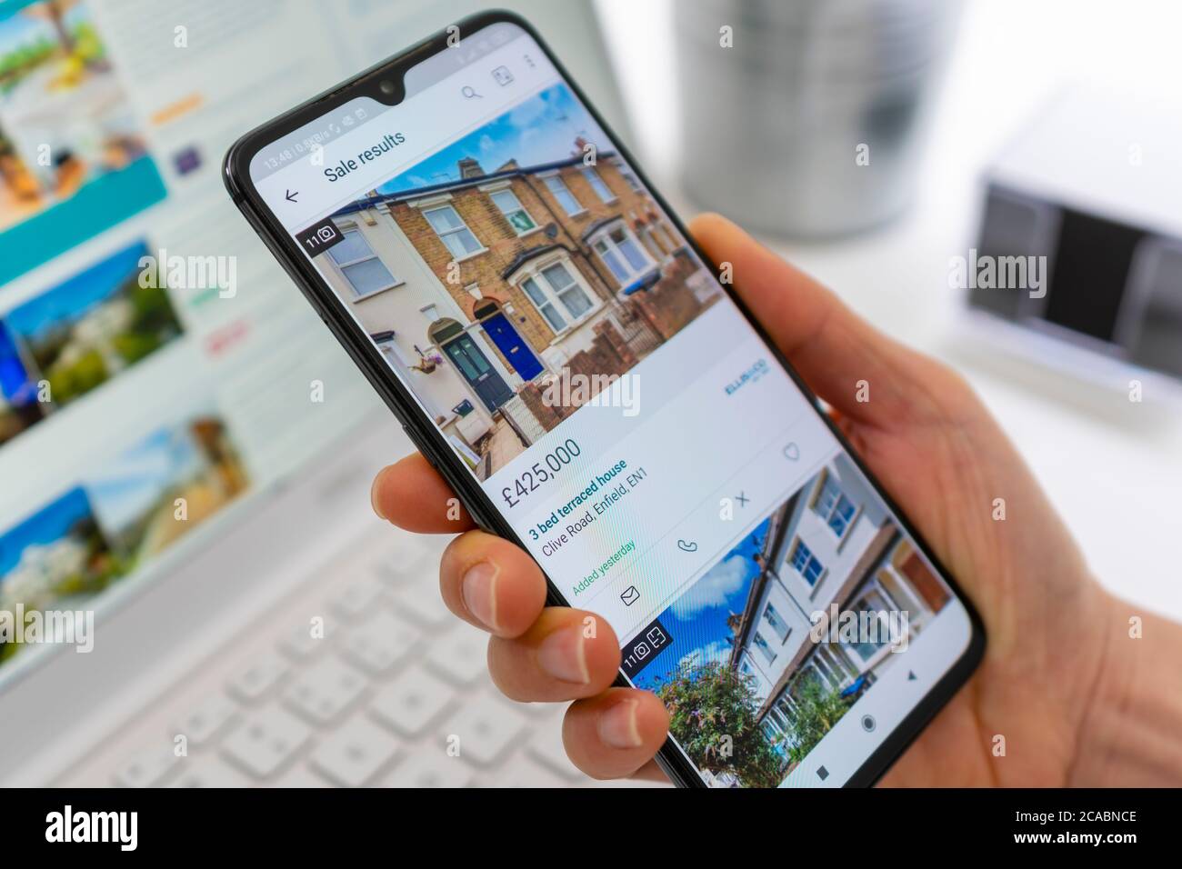 Browsing properties for sale in UK Stock Photo