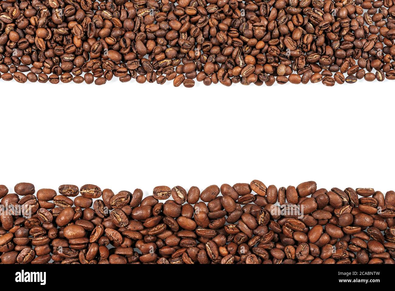 Roasted coffee beans. Two sorts of arabica on white background Stock ...