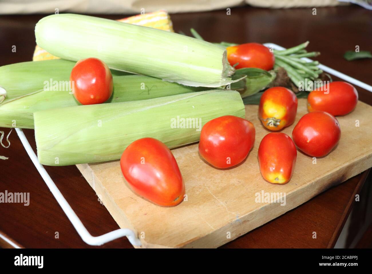 Fresh picked vegetables, tomatoes, corn, grean beans Stock Photo