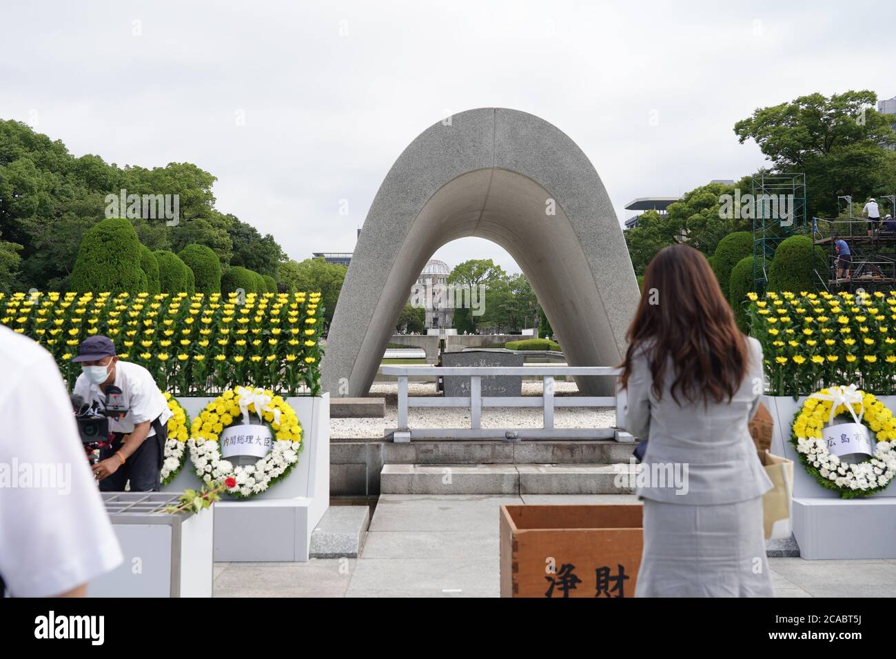 People praying at the Hiroshima Peace Memorial Ceremony.Hiroshima marks the 75th anniversary of the U.S. atomic bombing which killed about 150,000 people and destroyed the entire city during World War II. Stock Photo
