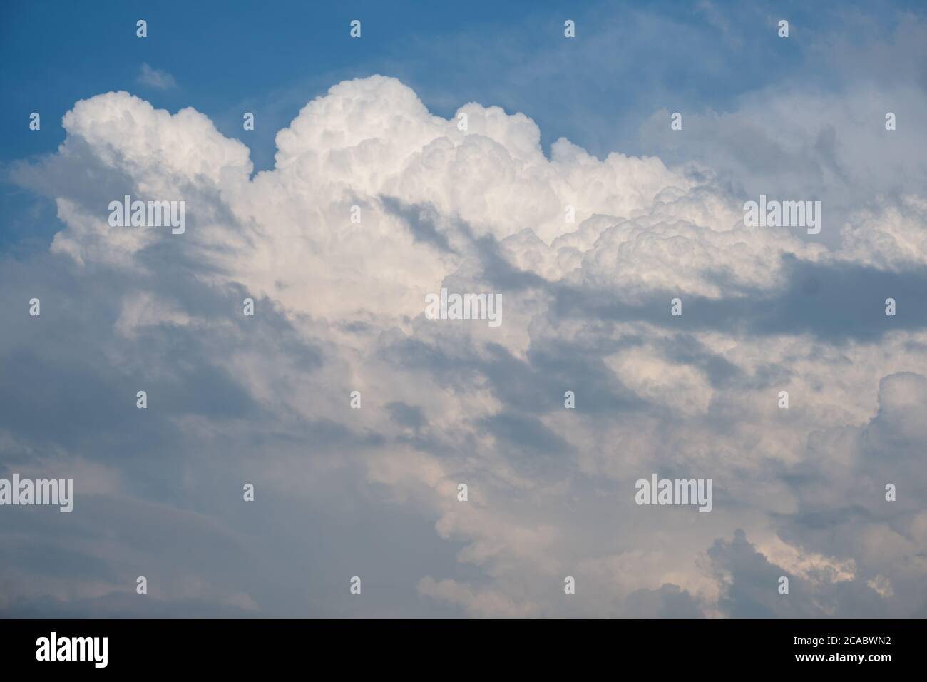 White cumulus clouds in blue sky background Stock Photo - Alamy