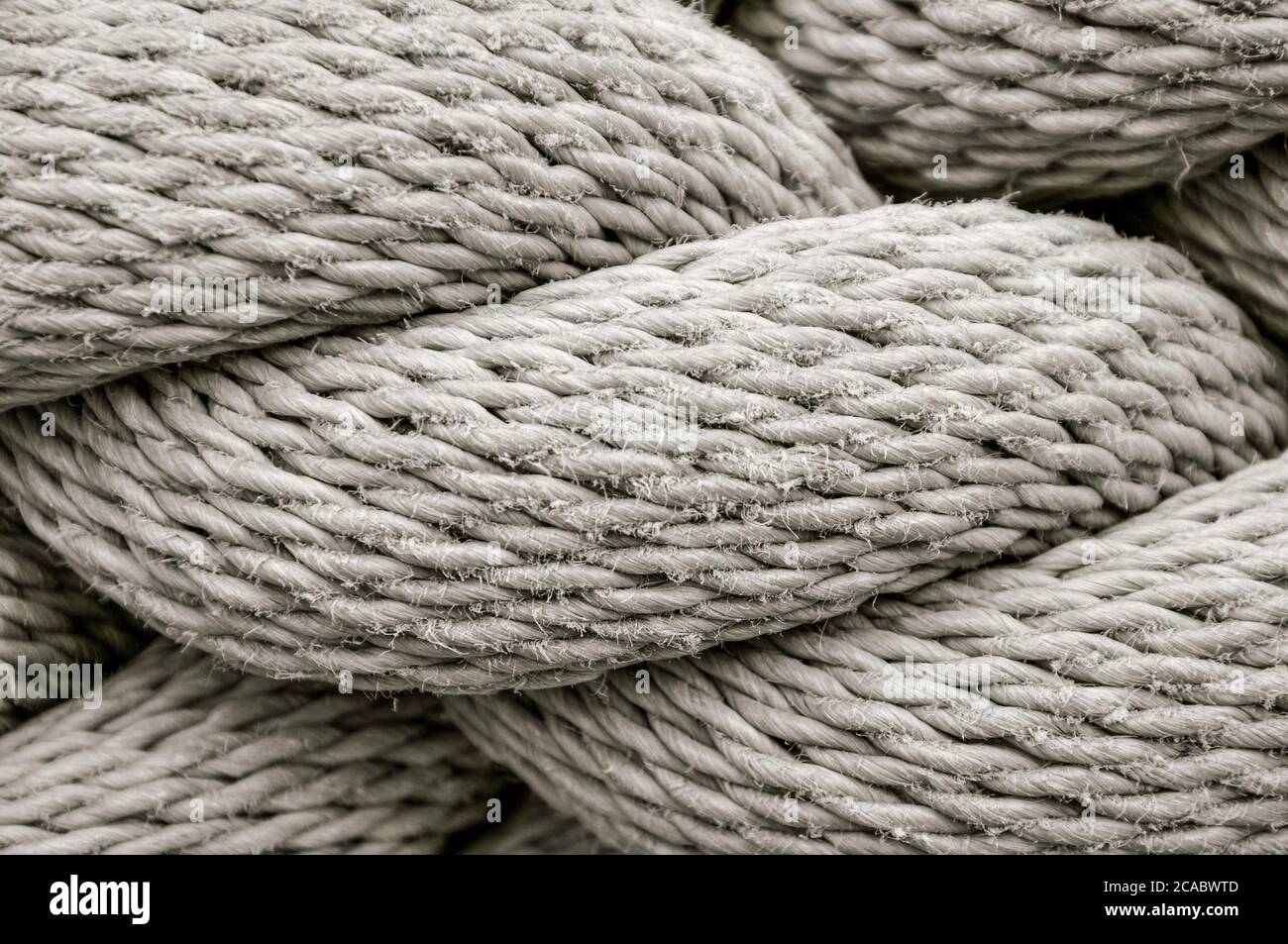 Thread Bigger Rope A close up view of a thick industrial rope showing all the threads and ...