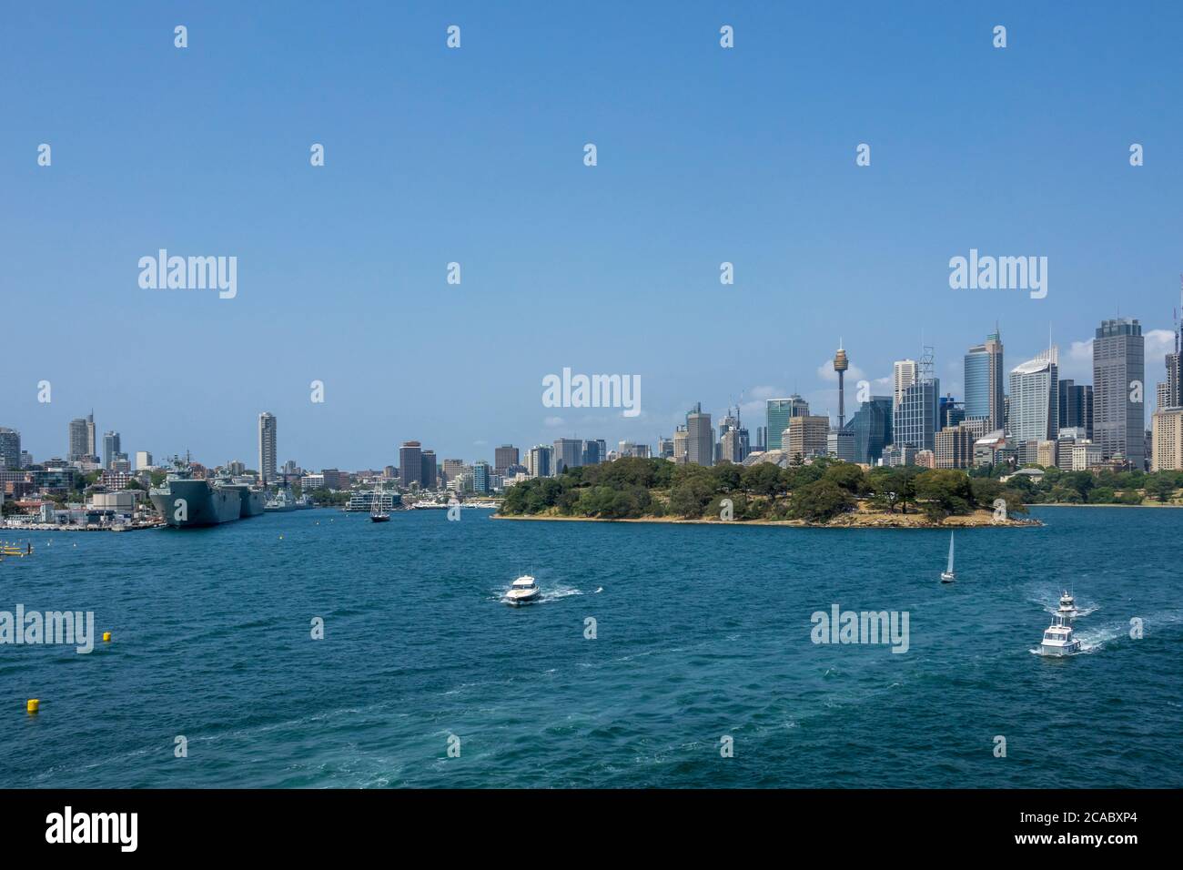 View of the Sydney skyline, Woolloomoolo and Garden Island naval base from Sydney Harbour, Sydney, Australia Stock Photo