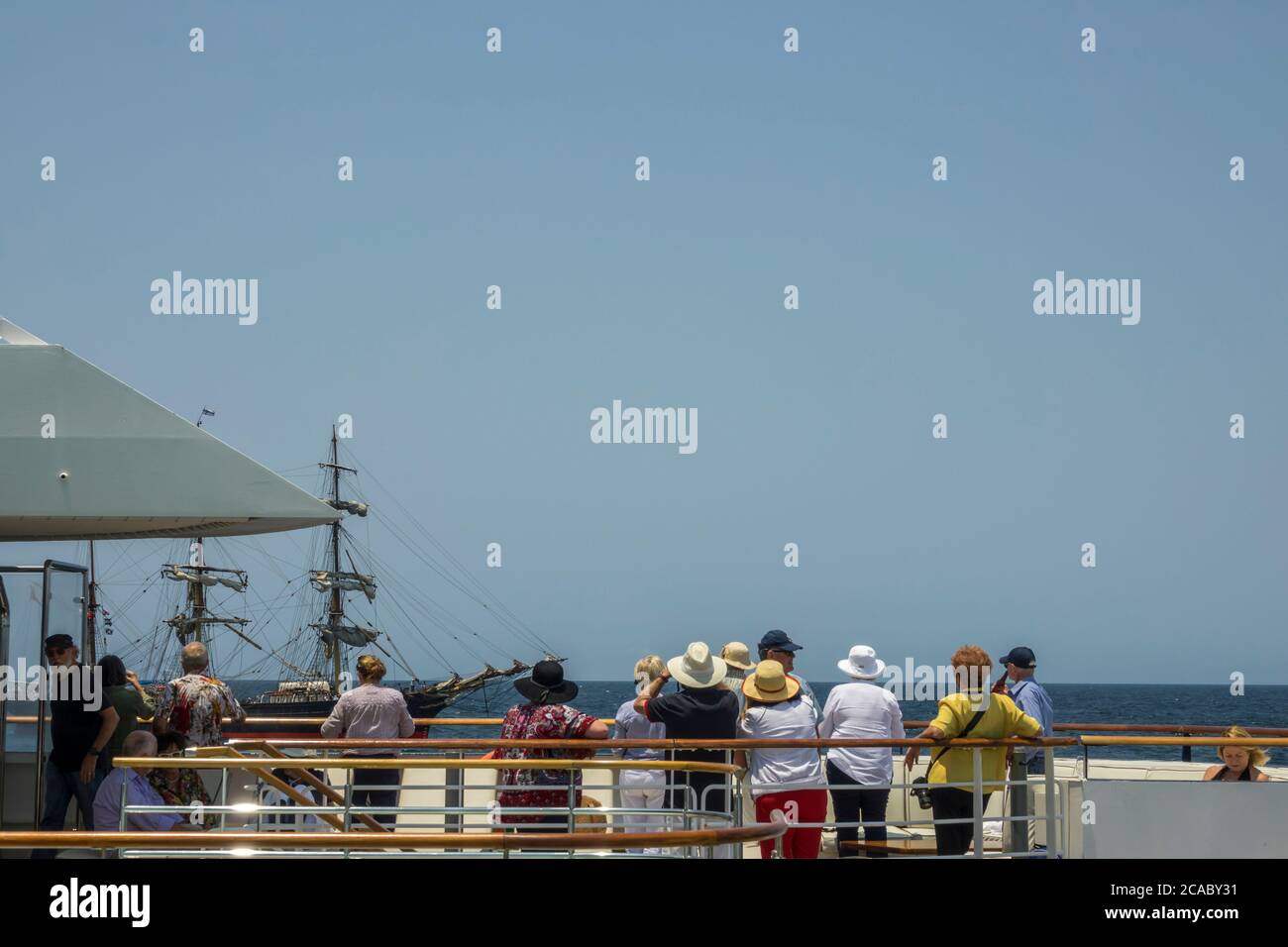 Passengers of Ponant's Le Laperouse watching the Tall Ship James Craig