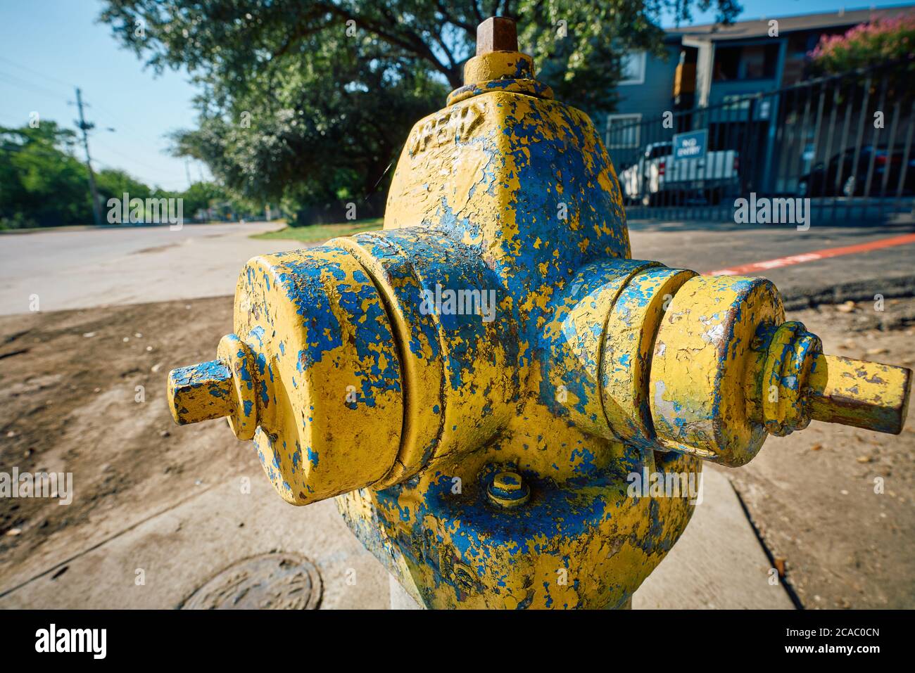 Street view of yellow fire hydrant Stock Photo