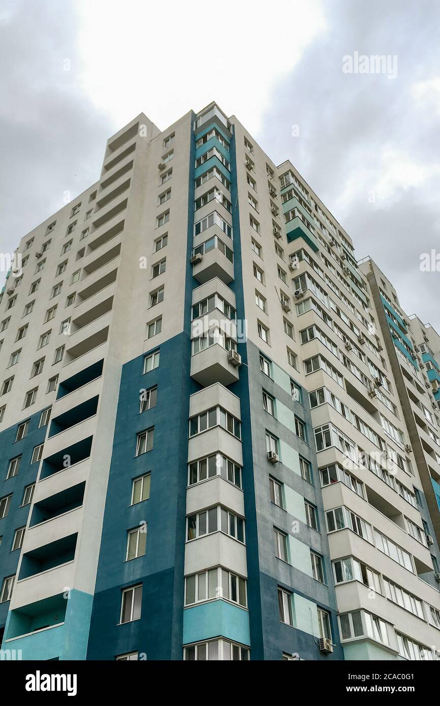 Typical high rise apartment building with balcony and windows ...