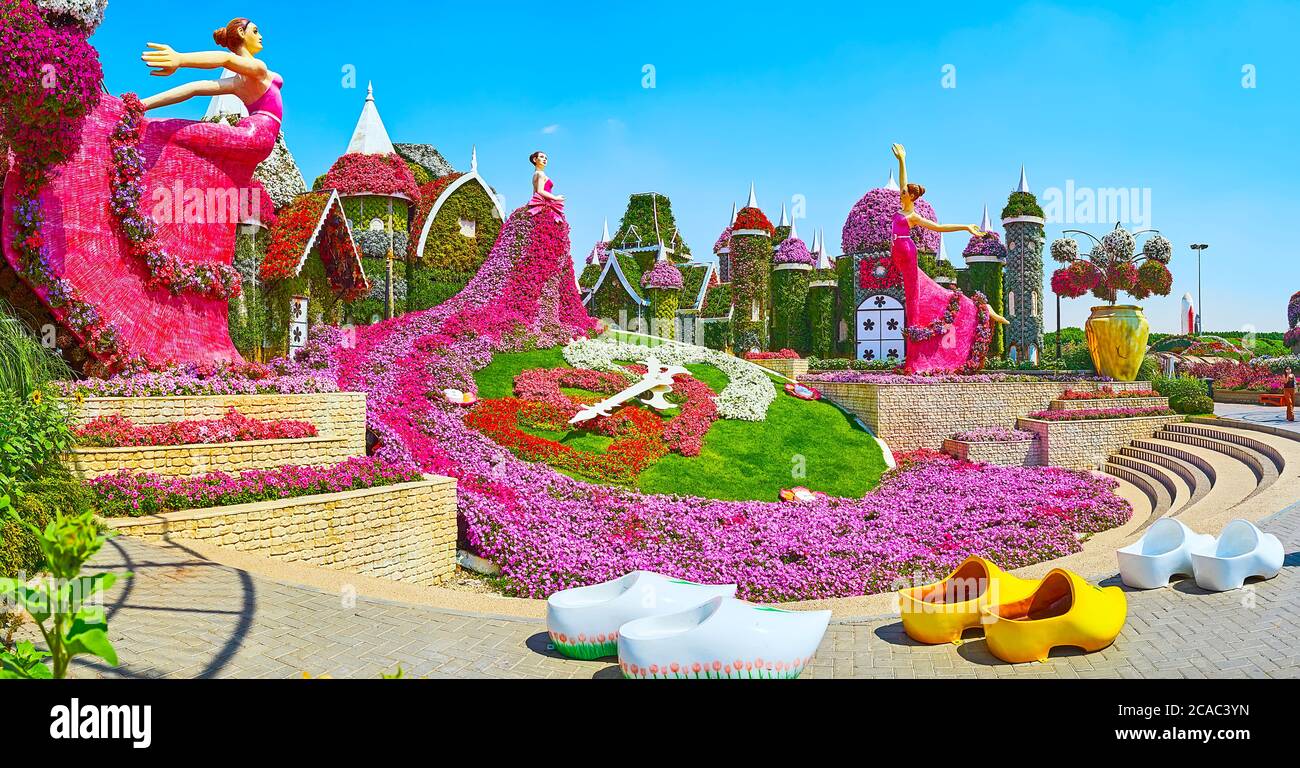 DUBAI, UAE - MARCH 5, 2020: Panorama with floral clock, dancing ballerinas, Dutch clogs (klomp) and small houses in Miracle Garden, on March 5 in Duba Stock Photo