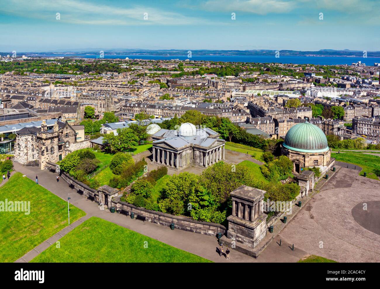 The Old City Observatory on Calton Hill in Edinburgh Scotland viewed from the Nelson Monument with views towards the Firth of Forth Stock Photo