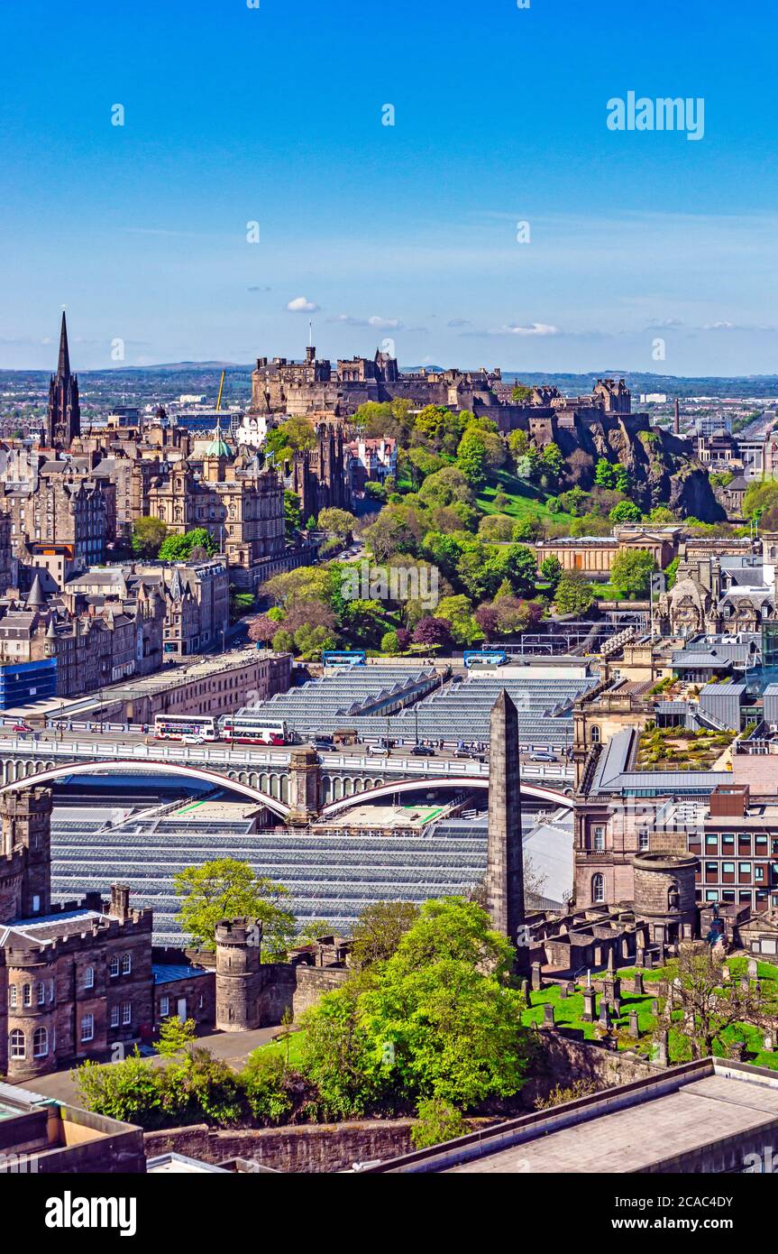 View from Nelson Monument on Calton Hill across Waverley Railway Station glass roof towards Edinburgh Castle in Edinburgh Scotland UK Stock Photo