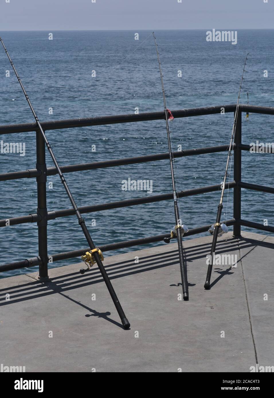 Huntington Rods Vertical shot of fishing rods in Huntington beach, La Joya and Santa ...