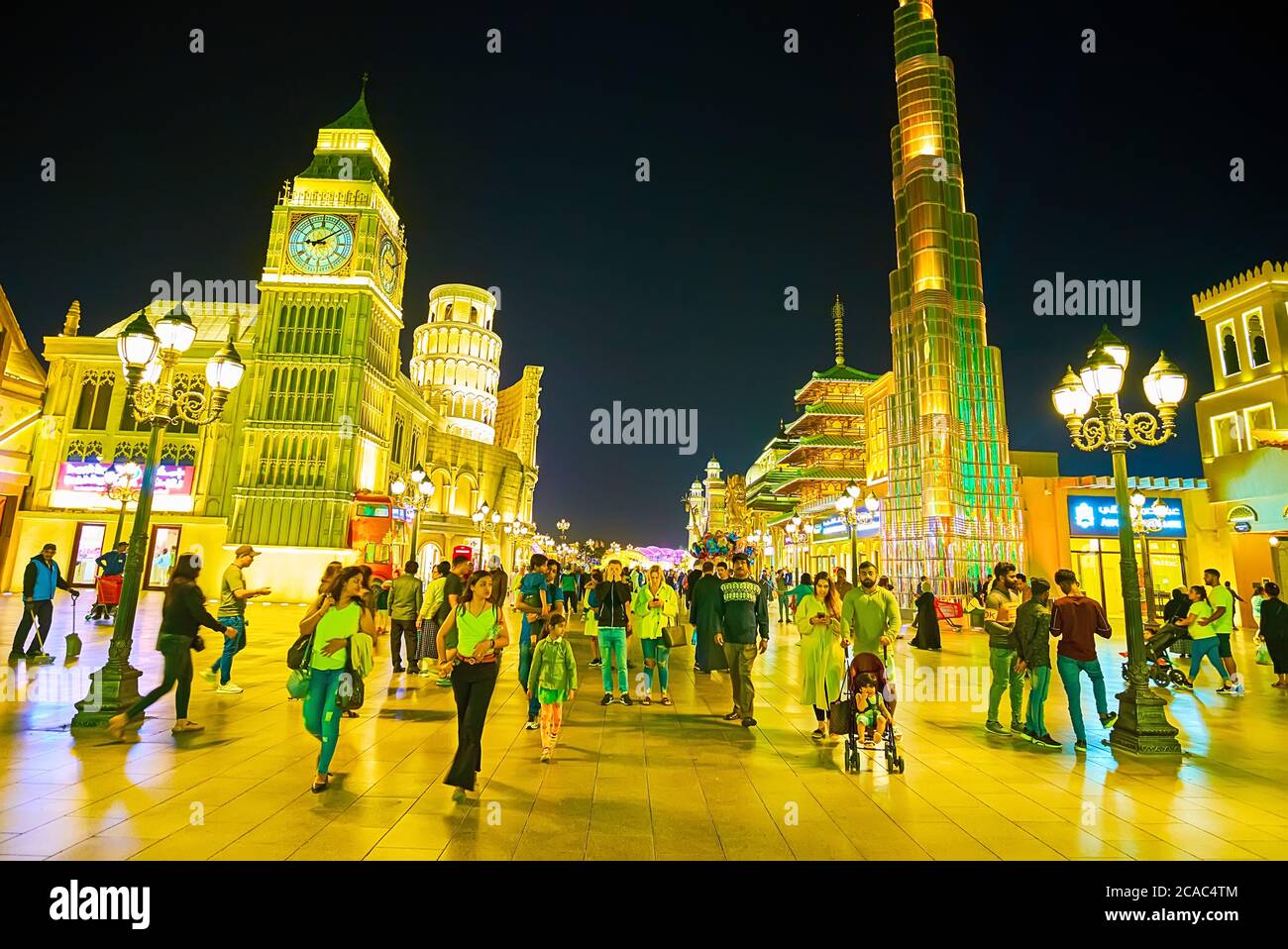 DUBAI, UAE - MARCH 5, 2020: The whole world is placed in one alley of Global Village - here is London Big Ben, Dubai Burj Khalifa, Pisa Leaning Tower, Stock Photo