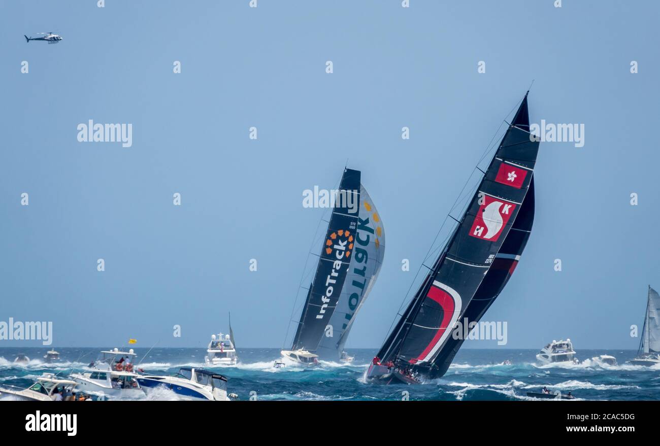 2019 Sydney to Hobart Yacht Race competitors 'InfoTrack' and 'Scallywag' passing South Head into Lady Bay after race start, New South Wales, Australia Stock Photo