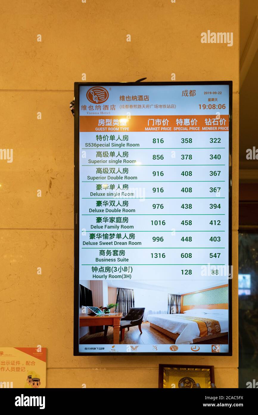 Room rates, including by the hour, in a hotel in central Chengdu Stock ...