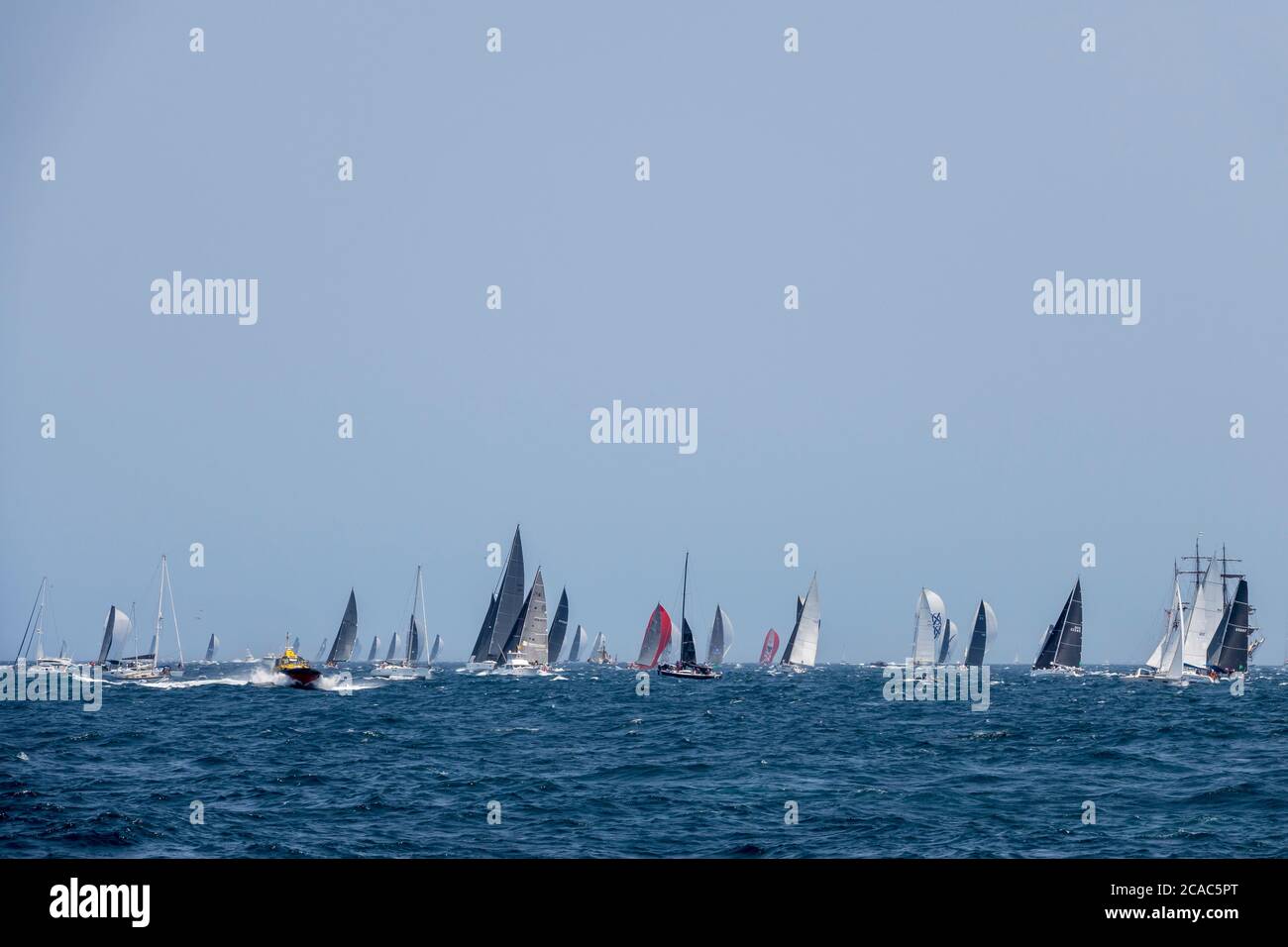 2019 Sydney to Hobart Yacht Race competitors  passing South Head into Tasman Sea after race start, New South Wales, Australia Stock Photo