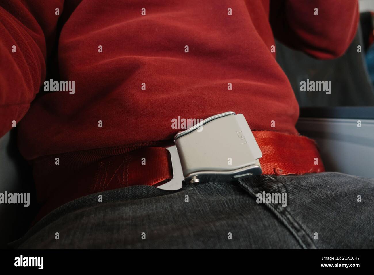 Fasten seat belt plane hires stock photography and images Alamy