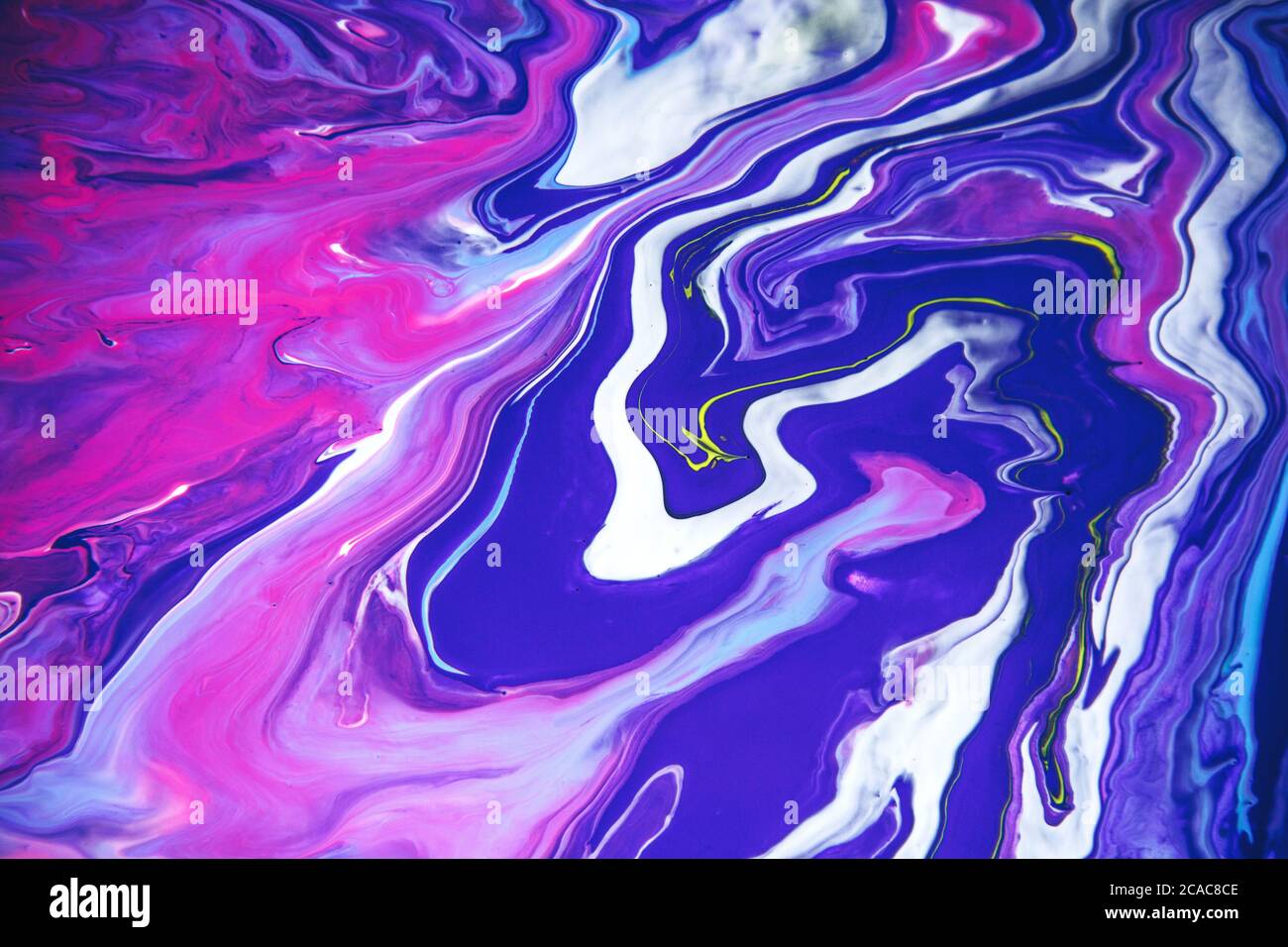 Acrylic paint liquid in trend purple and blue color mix background