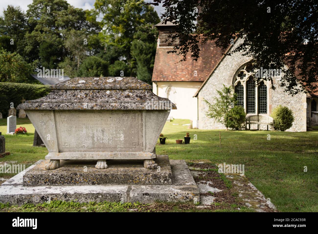 The churchyard and graveyard of St Simon and St Jude church in Bramdean Hampshire UK Stock Photo
