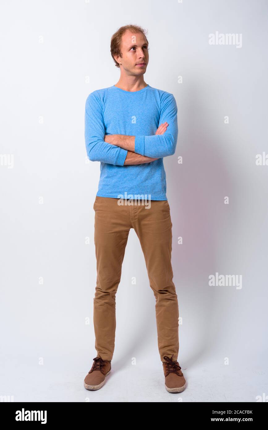 Man with blond hair against white background Stock Photo