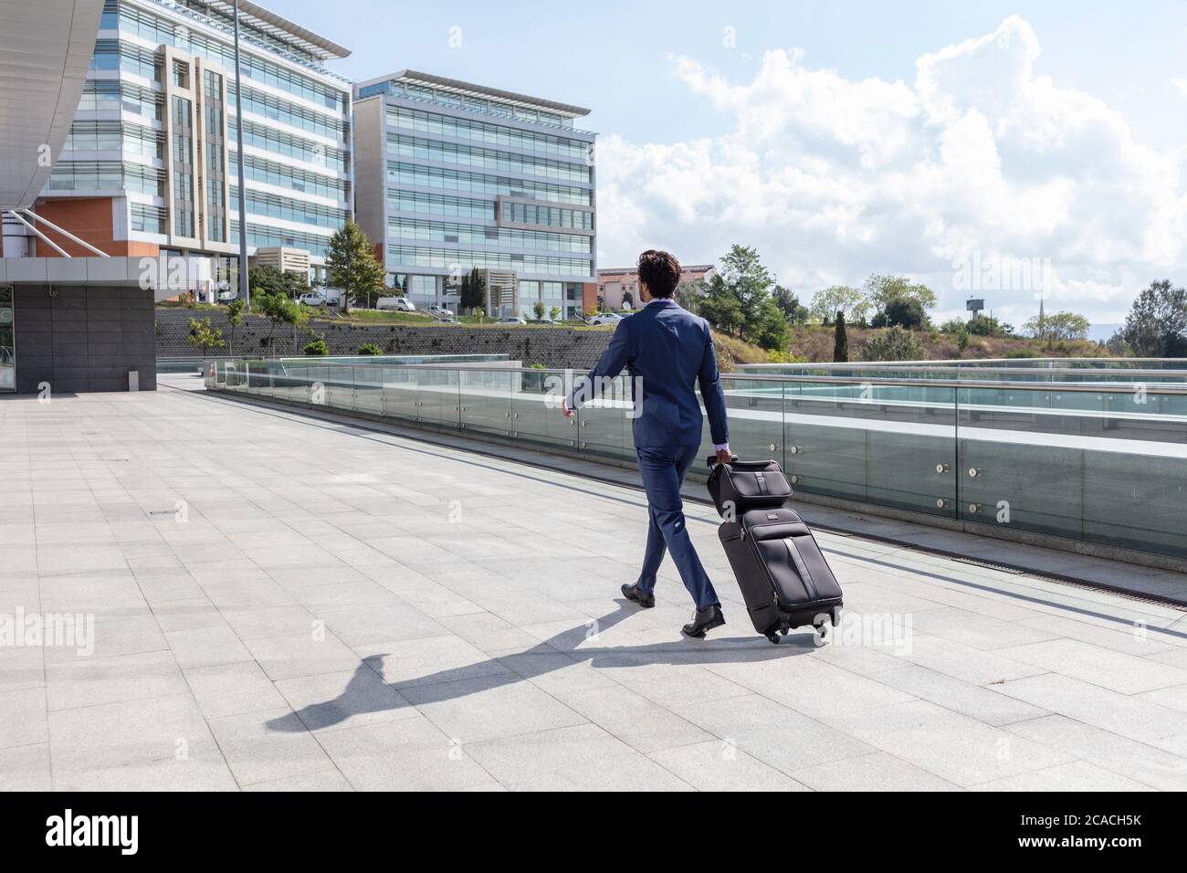Fashionable man walking outside hi-res stock photography and images - Alamy
