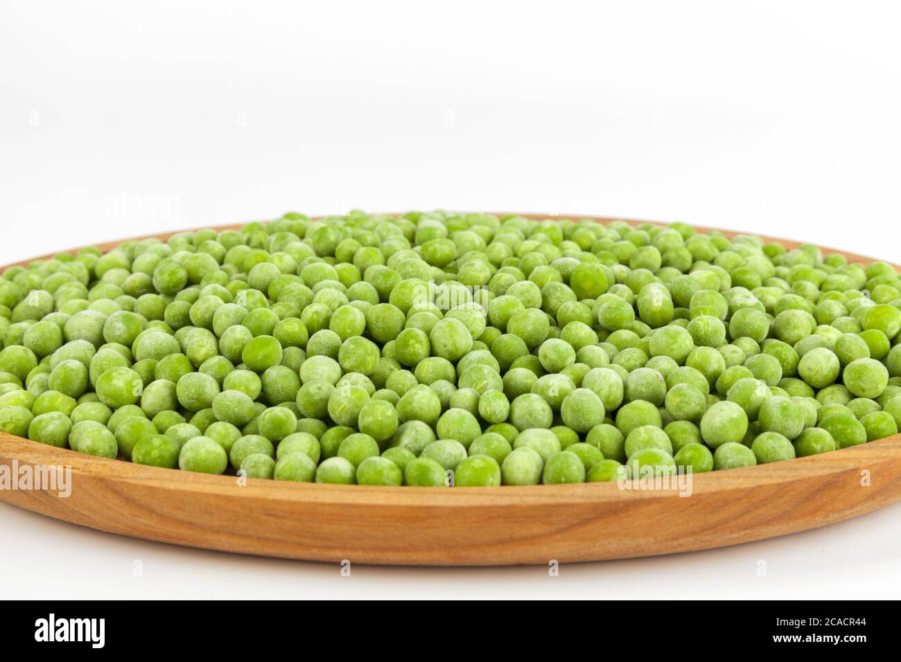 frozen peas isolated on white Stock Photo
