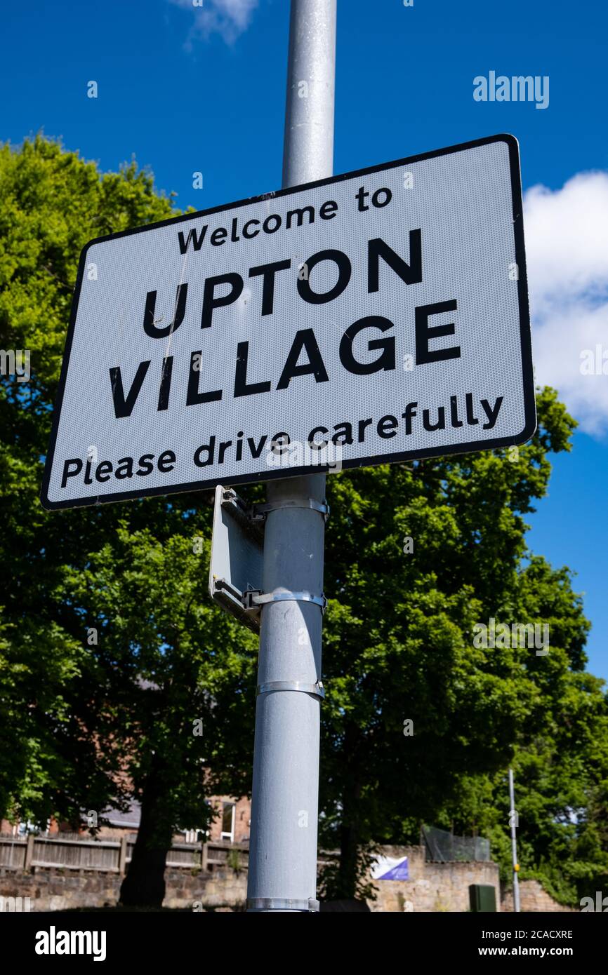 Sign welcoming people to Upton village and encouraging to drive safely ...