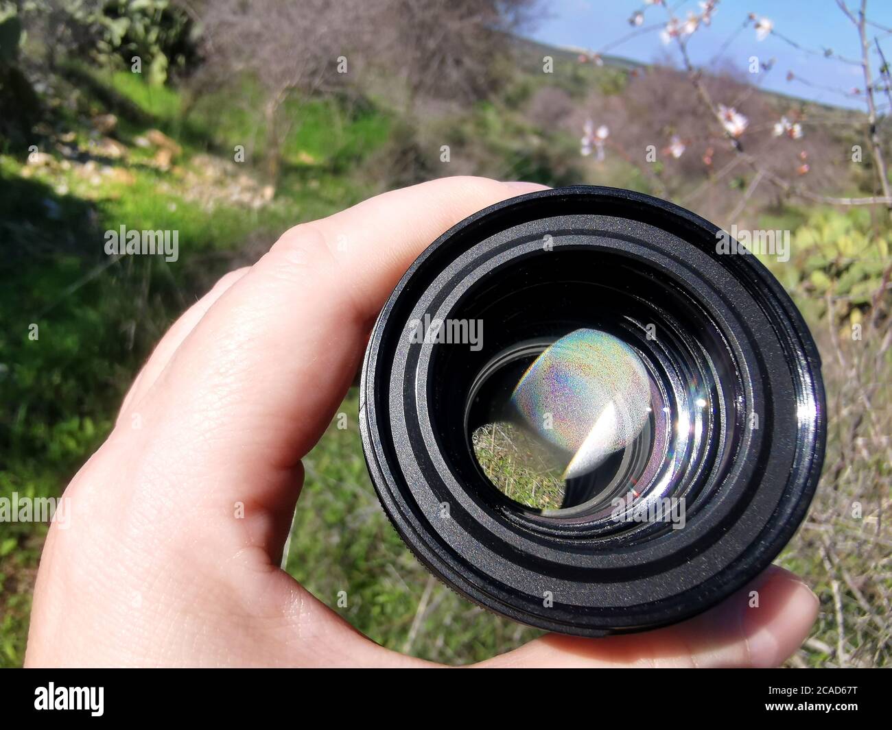 Camera lens fogged up due to temperature difference. Misted camera lens. Stock Photo