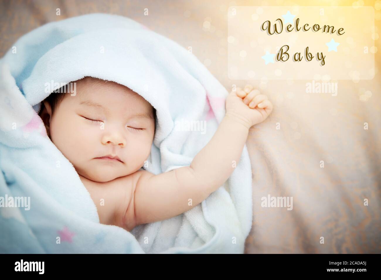 Colorful cute baby shower beautiful card with text welcome new baby in transparent frame, with the gold elements , star and wonderful bokeh Stock Photo