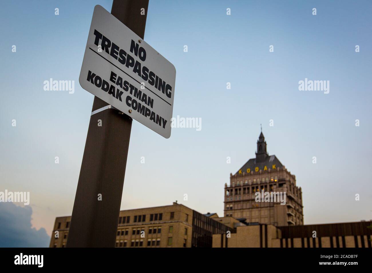 A sign with the text ' No trespassing | Eastman Kodak Company' outside the Eastman Kodak Headquarters in Rochester, New York. Once a giant, Eastman Kodak struggles to survive in the world of digital imaging. In August 2020 the company announced that they are switching over to pharmaceutical manufacturing. Stock Photo