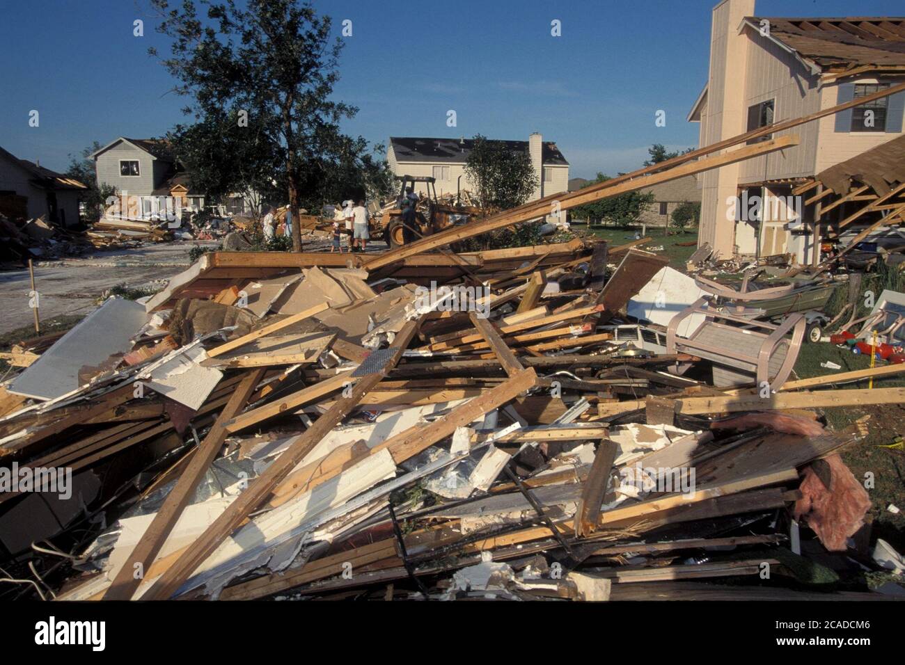 Cedar Park Texas USA, May 1997: Debris from tornado damage to Buttercup  Creek neighborhood. ©Bob Daemmrich Stock Photo - Alamy
