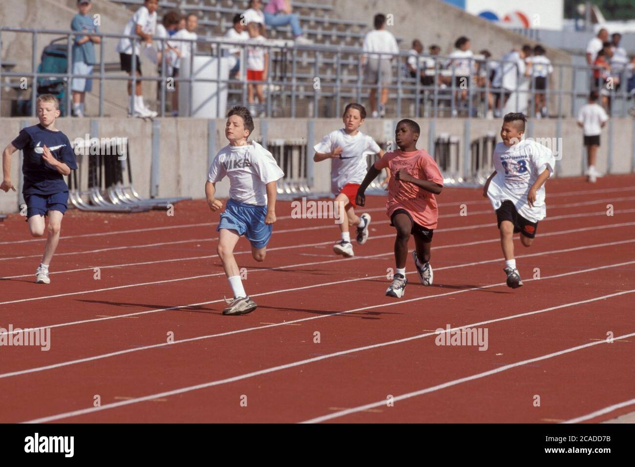 Elementary School Kids Run 100m Dash At Citywide Track Meet C Bob Daemmrich Stock Photo Alamy