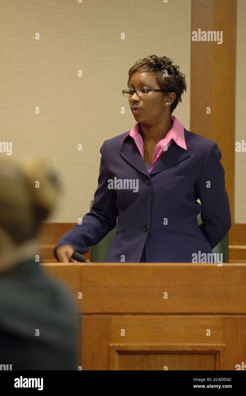 Austin Texas USA, 2006: A teen 'attorney' speaks as Texas high school students participate in mock court hearings as part of YMCA Youth in Government program at the state Supreme Court courtroom. Students learn more about the legal profession by acting out trials in competition with their peers.  ©Bob Daemmrich Stock Photo